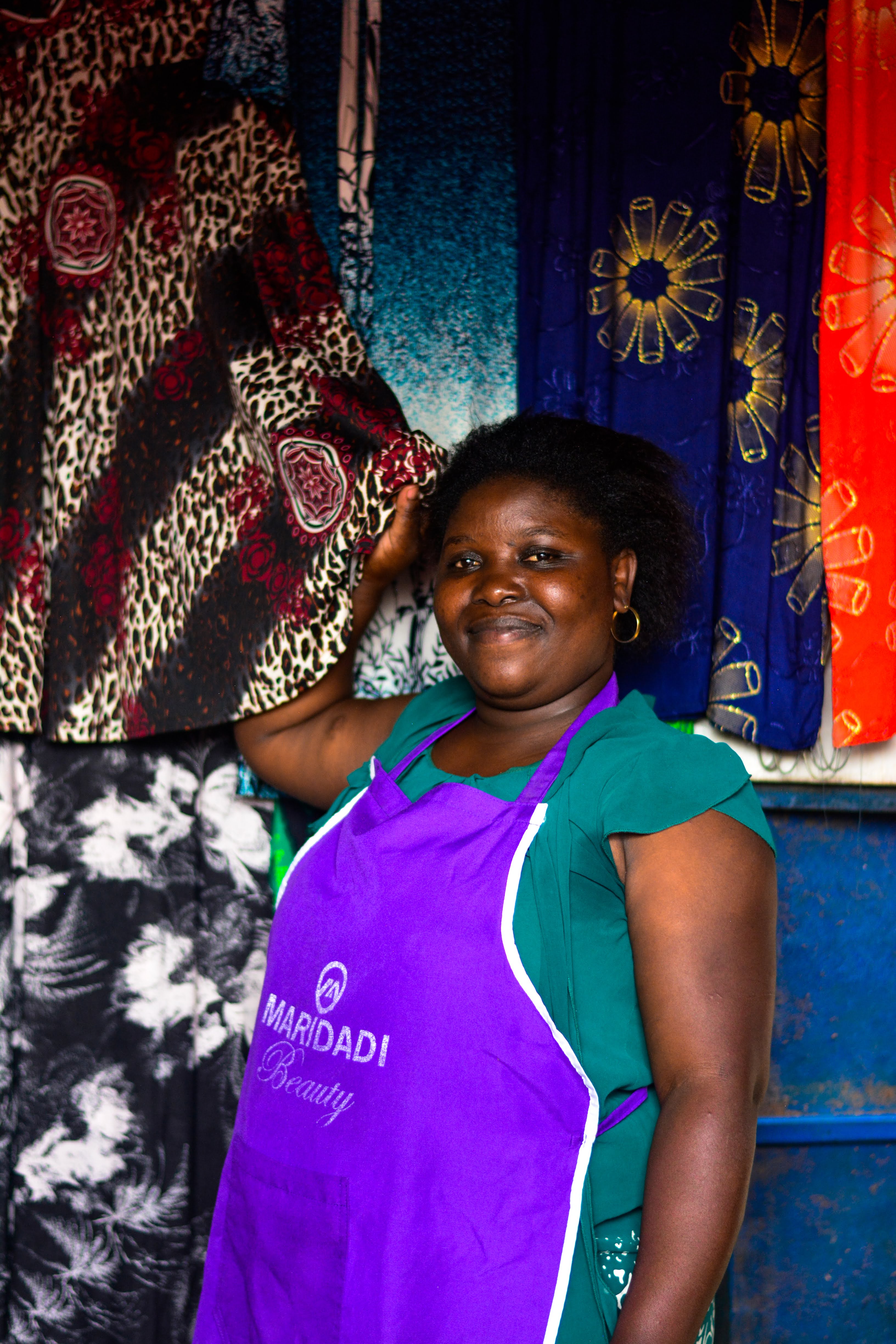 Christina proudly displays some of the wares at her salon