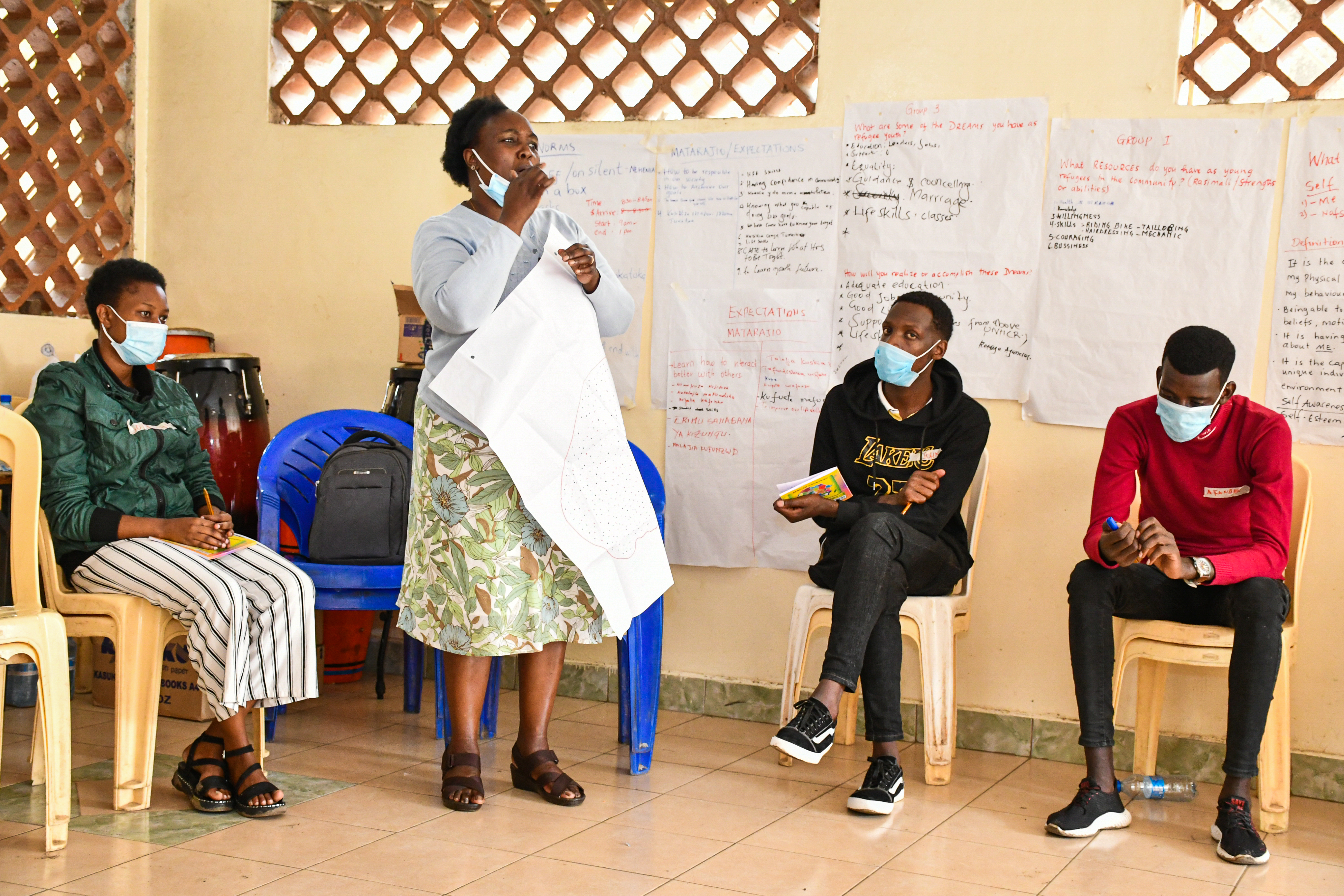 Clotilda, head of the Counseling department, takes participants through a session