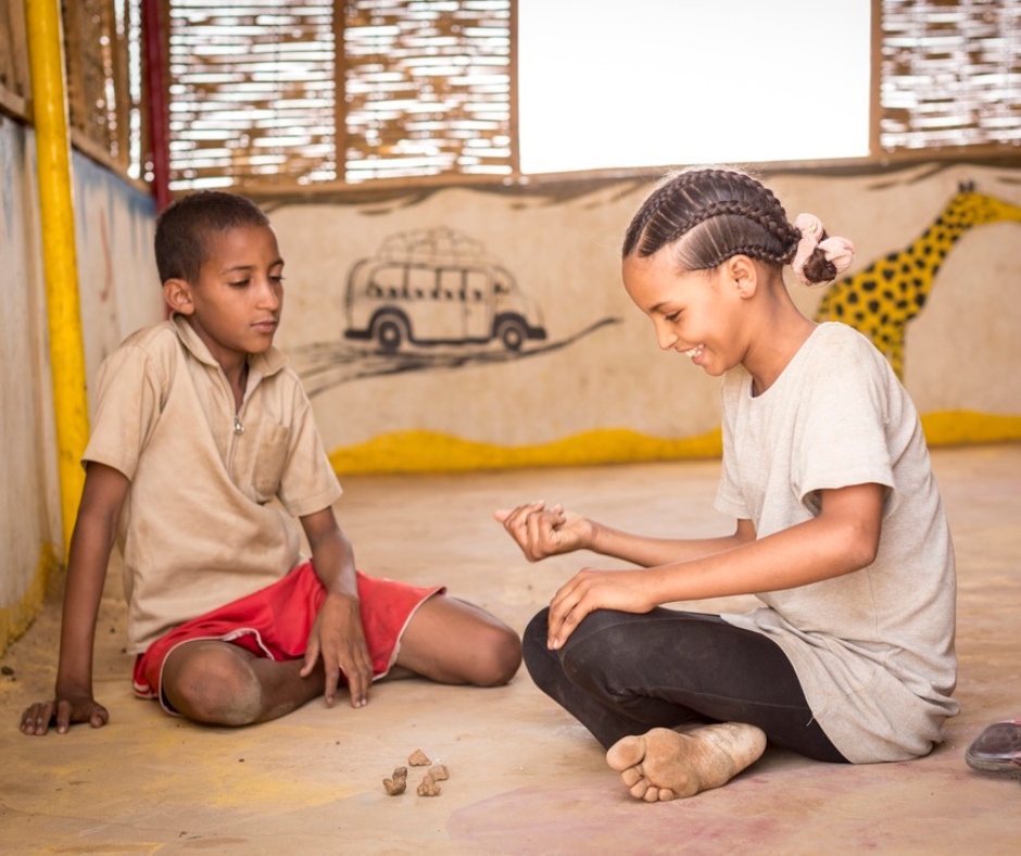 Refugee Children playing a game